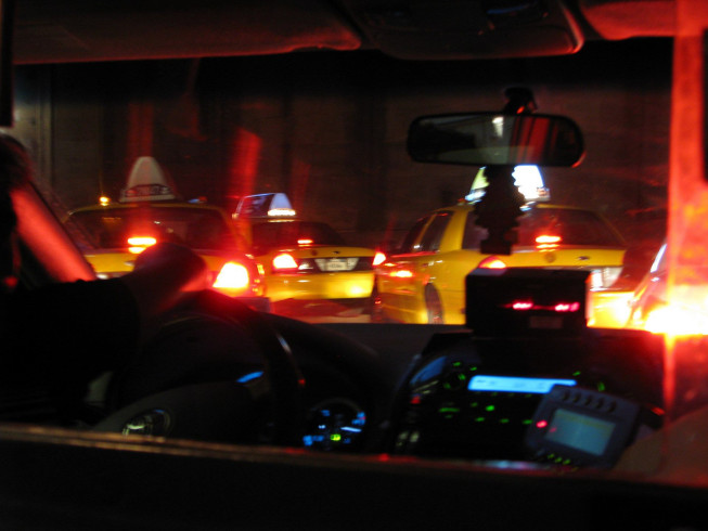 Inside a taxi looking out