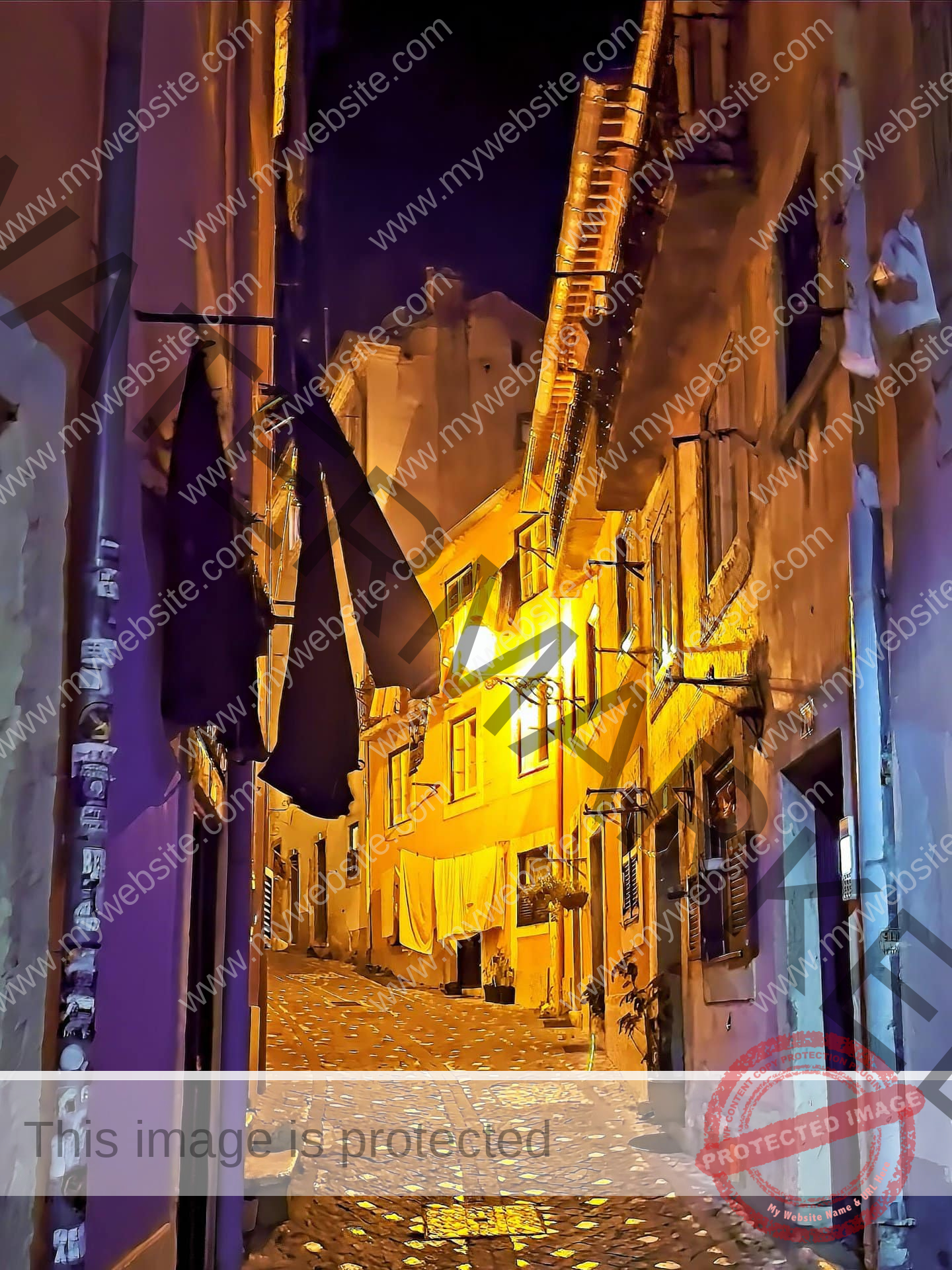 Alfama street at night - the people of Alfama really like hanging out their laundry